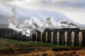 The Winter Cumbrian Mountain Express steams over the Ribblehead Viaduct on the Settle Carlisle line. Picture by Bruce Rollinson.