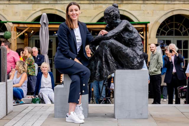 Library image of Suranne Jones unveiling a statue at the Piece Hall in Halifax, of Anne Lister, the person she portrays in the BBC drama Gentleman Jack