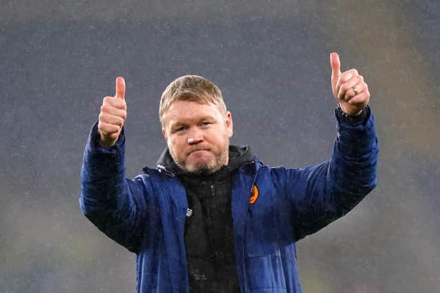 Hull City manager Grant McCann gestures to the fans after his team's win at Cardiff City. Picture: Nick Potts/PA