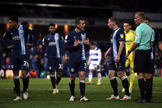 Huddersfield Town's Harry Toffolo appeals to referee Graham Scott during the Championship clash at QPR which the Terriers lost 1-0. Picture: Simon Marper/PA