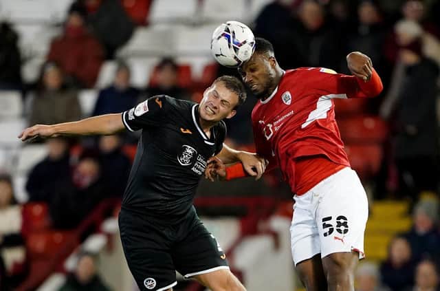 Action from Barnsley's game with Swansea. Picture: PA.