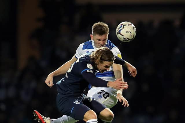 Huddersfield Town's Danny Ward (left) and Queens Park Rangers' Jimmy Dunne (Picture; PA)