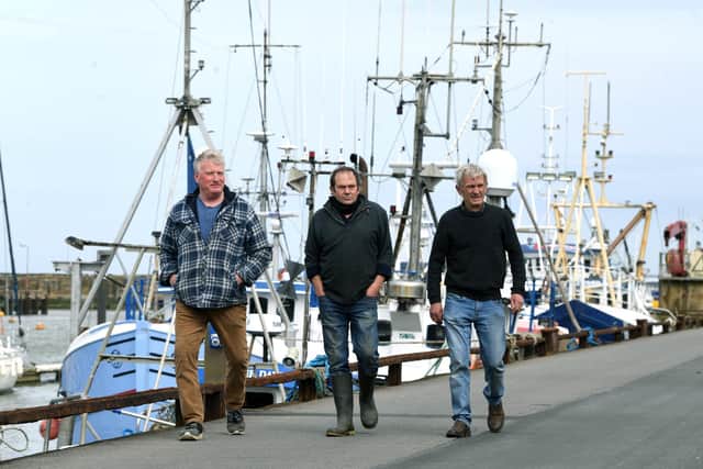 Fishermen, from left, Andrew Sanderson, Frank Powell and Shaun Wingham, pictured at Bridlington harbour Picture: Jonathan Gawthorpe