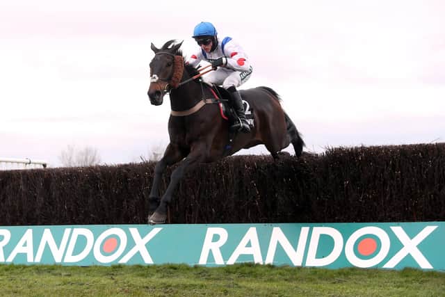 Clan Des Obeaux and Harry Cobden surge clear in the Betway Bowl at Aintree.