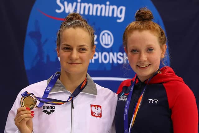 Great Britain's World bronze medal winner Zara Mullooly, right, with Poland’s gold-medal winner Oliwia Jablonska after the Women's 400m Freestyle S10 Final in 2019. Picture: Catherine Ivill/Getty Images.