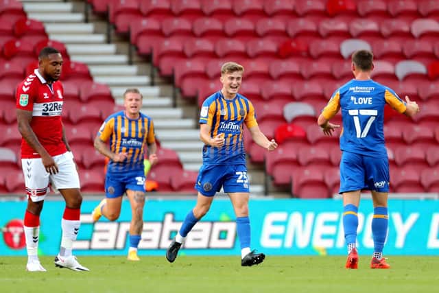Shrewsbury Town's Scott High (second right) celebrates scoring 'that' goal against Middlesbrough during the Carabao Cup first round match at Riverside Stadium in September last yearPicture: Richard Sellers/PA
