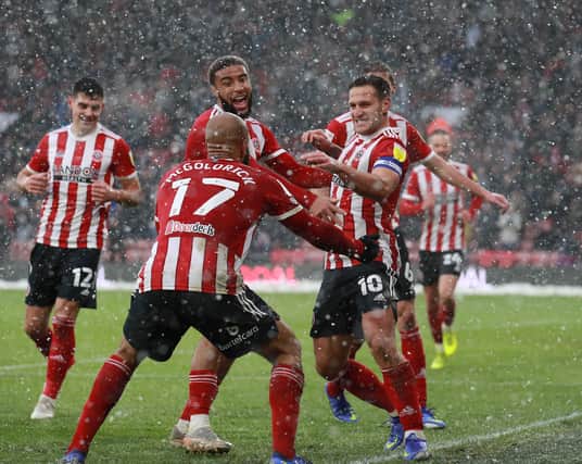 ON THE MARK: Sheffield United's Billy Sharp celebrates scoring the hosts' second goal against Bristol City at Bramall Lane. Picture: Simon Bellis / Sportimage