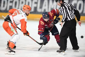 Sheffield Steelers' Justin Hodgman, left, battles for the puck during the 3-1 Elite League win at Guildford Flames Picture: John Uwins/EIHL