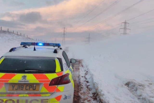 Police had to dig multiple vehicles out of the snow