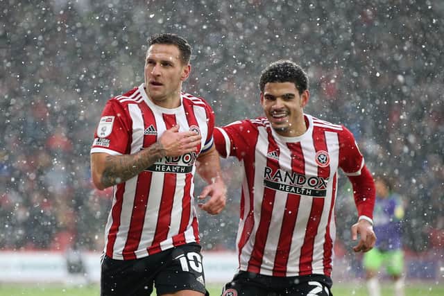 Sheffield United captain Billy Sharp and Morgan Gibbs-White celebrate the Blades' captain's goal against Bristol City at Bramall Lane on Sunday Picture: Alistair Langham/Sportimage