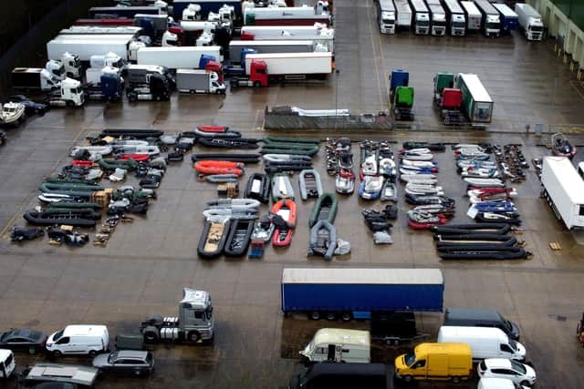 A view of boats used by people thought to be migrants are stored at a storage facility near Dover in Kent, after 27 people died on Wednesday in the worst-recorded migrant tragedy in the Channel.