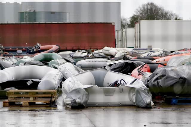A view of boats used by people thought to be migrants are stored at a storage facility near Dover in Kent, after 27 people died on Wednesday in the worst-recorded migrant tragedy in the Channel.