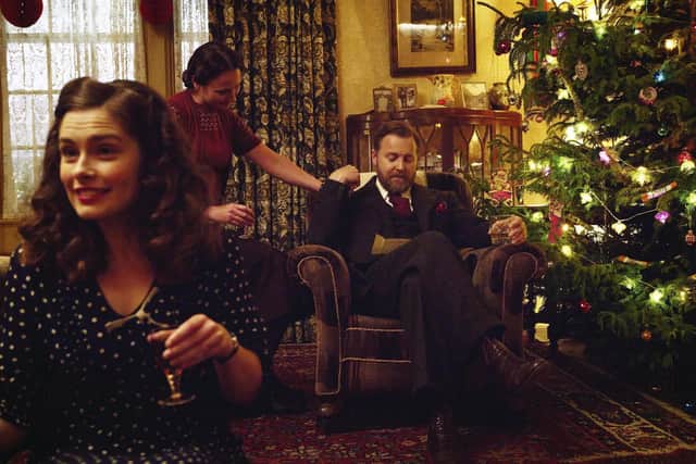 Christmas at Skeldale House: Left: Helen Alderson (Rachel Shenton) Middle: Mrs Hall (Anna Madeley) Right: Siegfried Farnon (Samuel West).
