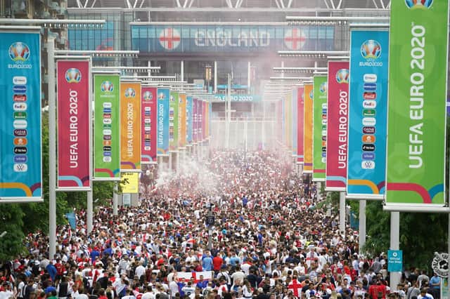 File photo dated 11-07-2021 of England fans outside the ground at Wembley Stadium, London.
