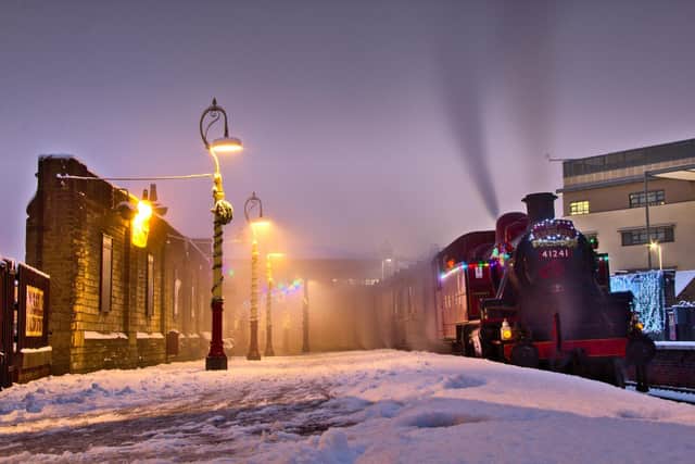 The snowy scene as the ‘Elf Express’ arrived in Keighley station. (Picture: Robert Batty)
