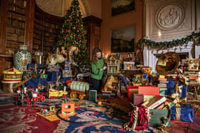 Caitlin Wall helps set up the toys for the Upon a Christmas Wish display at Harewood House near Leeds. (Tony Johnson).