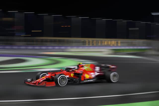 Ferrari driver Carlos Sainz of Spain in action during practice session for the Saudi Arabian Grand Prix in Jiddah, Friday, Dec. 3, 2021. (AP Photo/Hassan Ammar)