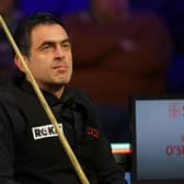 Ronnie O'Sullivan sits back in his chair mid break as the crowd leave their seats during his match with Kyren Wilson. Picture: PA
