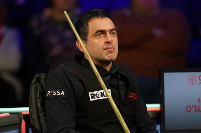 Ronnie O'Sullivan sits back in his chair mid break as the crowd leave their seats during his match with Kyren Wilson. Picture: PA