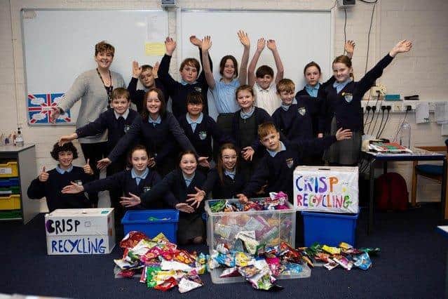 Students at Lee Mount with the crisp packets they have collected