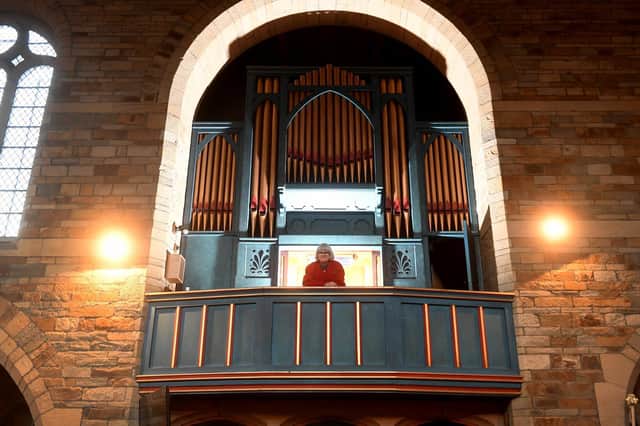 Pam Dimbleby, the church’s musical director, with the organ
