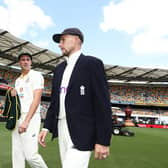 Friendly foes: Australia's Pat Cummins  and England's Joe Root during the Ashes Series Launch at The Gabba in Brisbane, Australia. Pictures: Jason O'Brien/PA