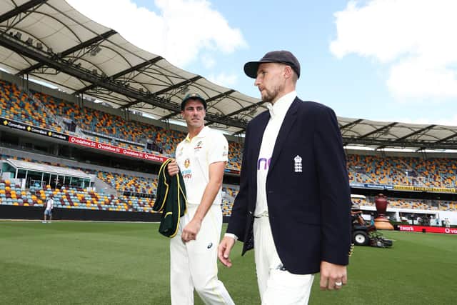 Friendly foes: Australia's Pat Cummins and England's Joe Root during the Ashes Series Launch at The Gabba in Brisbane, Australia. Pictures: Jason O'Brien/PA