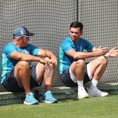 Explaining decision: England coach Chris Silverwood talks with James Anderson. Pictures: Jason O'Brien/PA
