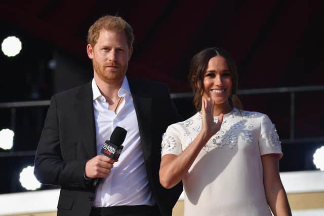 Prince Harry and Meghan Markle speak during the 2021 Global Citizen Live festival at the Great Lawn, Central Park on September 25, 2021 in New York City. Photo by ANGELA WEISS/AFP via Getty Images.