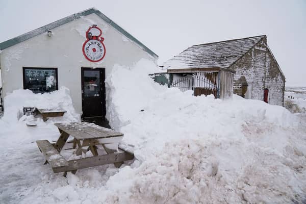 Snowed in businesses on the A53 close to Buxton in Derbyshire, amid freezing conditions in the aftermath of Storm Arwen.