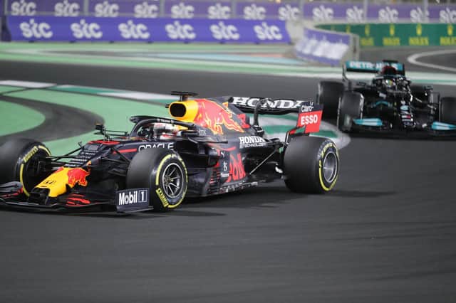 One-two: Max Verstappen leads Lewis Hamilton in Saudi Arabia before eventually losing. (Picture: AP)