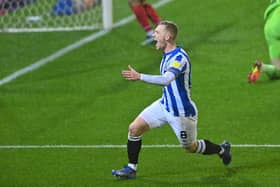 Huddersfield Town captain Lewis O'Brien celebrates his goal in Saturday's derby at Barnsley. Picture: Bruce Rollinson.