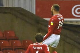 Get in: Carlton Morris celebrates his equaliser for Barnsley. Picture: Bruce Rollinson