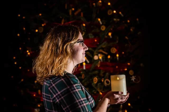 Pictured Hannah Highsted, Visitor Experience Officer, for Nunnington Hall near the imposing Victorian Christmas tree in the Stone Hall. Writer: James Hardisty
