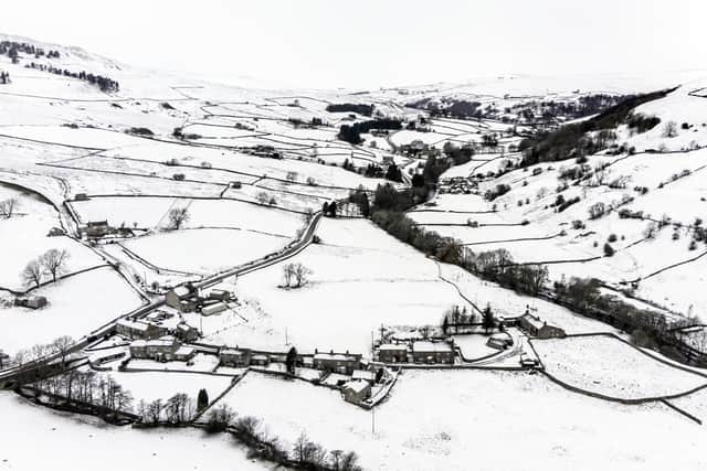 Snow covers fields and hills in the Arkengarthdale valley, North Yorkshire, amid freezing conditions in the aftermath of Storm Arwen