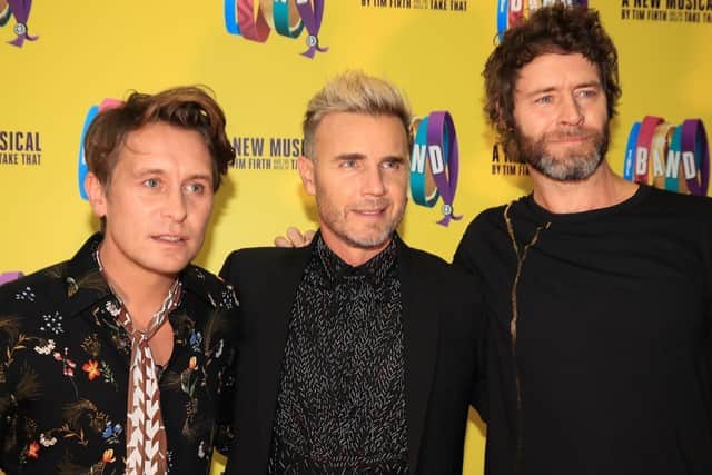 (left-right) Mark Owen, Gary Barlow, and Howard Donald of Take That Photo credit: Peter Byrne/PA Wire