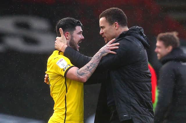 Barnsley captain Alex Mowatt celebrates the team's win with manager Valerien Ismael at Bournemouth last year. (Photo by Charlie Crowhurst/Getty Images)