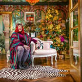 Siobhan in the first reception room where rich colour and pattern now play second fiddle to the wonderfully “razzle dazzle ’em” Christmas tree.