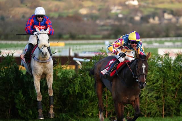 Harry Bannister riding Diesel D'Allier (left) before passing Jack Tudor riding Potters Corner to win the Glenfarclas Crystal Cup Cross Country Handicap Chase during day one of The International meeting at Cheltenham Racecourse.