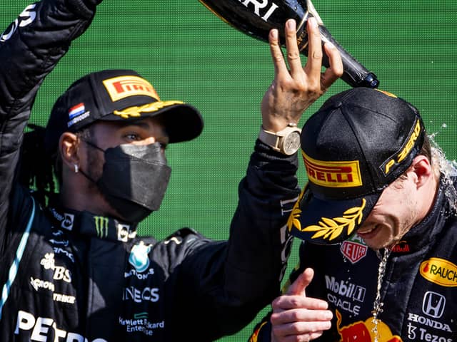Max Verstappen (Red Bull Racing) celebrates winning the Dutch Grand Prix at the Zandvoort circuit together with Lewis Hamilton (Mercedes). (Picture: ANP Sport via Getty Images)