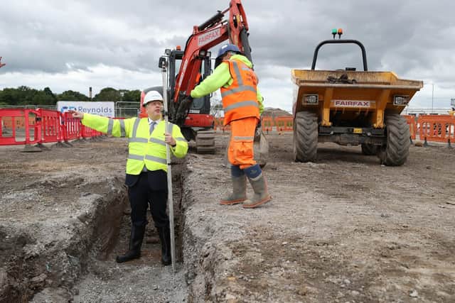 Boris Johnson at the site of the factory in July 2020.