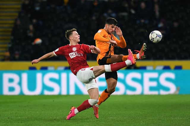 Ryan Longman, who opened the scoring for Hull City, in the thick of the action against Bristol City. Picture: Jonathan Gawthorpe.