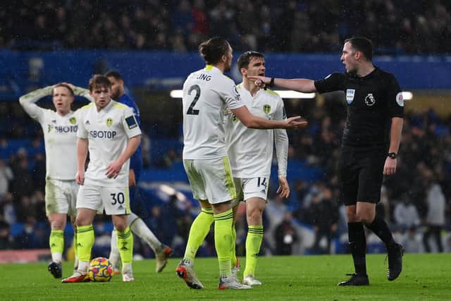 FRUSTRATION: Luke Ayling appeals to referee Chris Kavanagh after he awarded a late penalty to Chelsea. Picture: Getty Images.