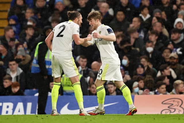 EQUALISER: Luke Ayling celebrates with Joe Gelhardt after the youngster had drawn Leeds level at Stamford Bridge. Picture: Getty Images.