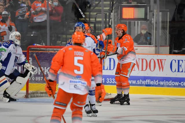 Marc-Olivier Vallerand celebrates his second goal against Coventry on Saturday. Picture: Dean Woolley/EIHL.