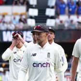 Defeated: Captain Joe Root walks off with his team after defeat during day four of the first Ashes Test. Pictures: Jason O'Brien/PA