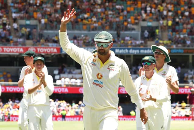 Hero: Australia's Nathan Lyon salutes the crowd.