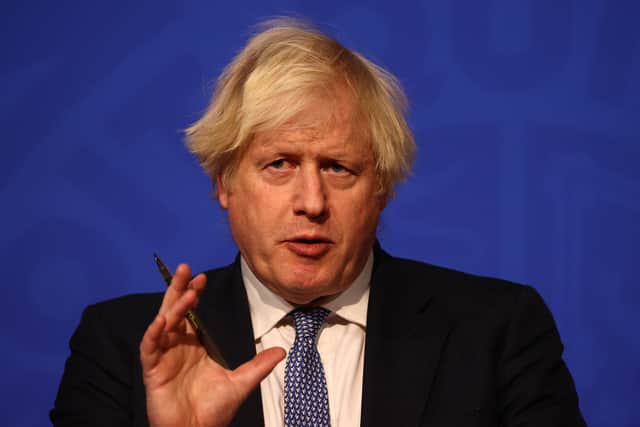 Boris Johnson is under mounting pressure over sleaze scandals and the Omicron variant.
