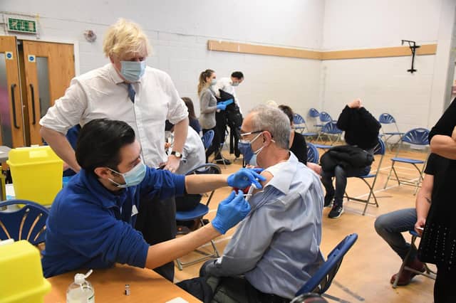 Prime Minister Boris Johnson during a visit to the Stow Health Vaccination centre in Westminster, central London.