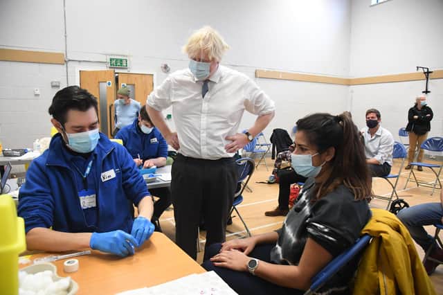 Prime Minister Boris Johnson during a visit to the Stow Health Vaccination centre in Westminster, central London